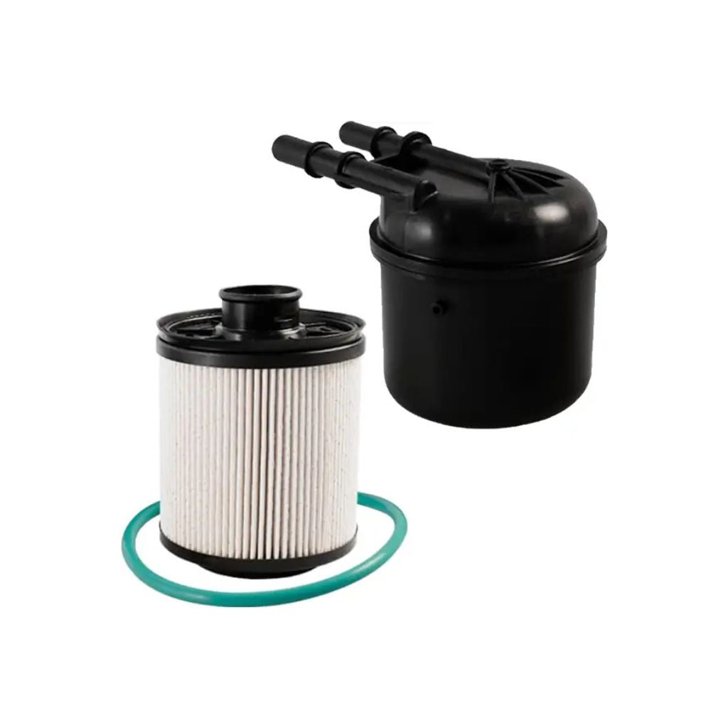 Motorcraft FD-4615 replacement fuel filter and black filter housing with green O-ring for 6.7L Powerstroke diesel trucks.